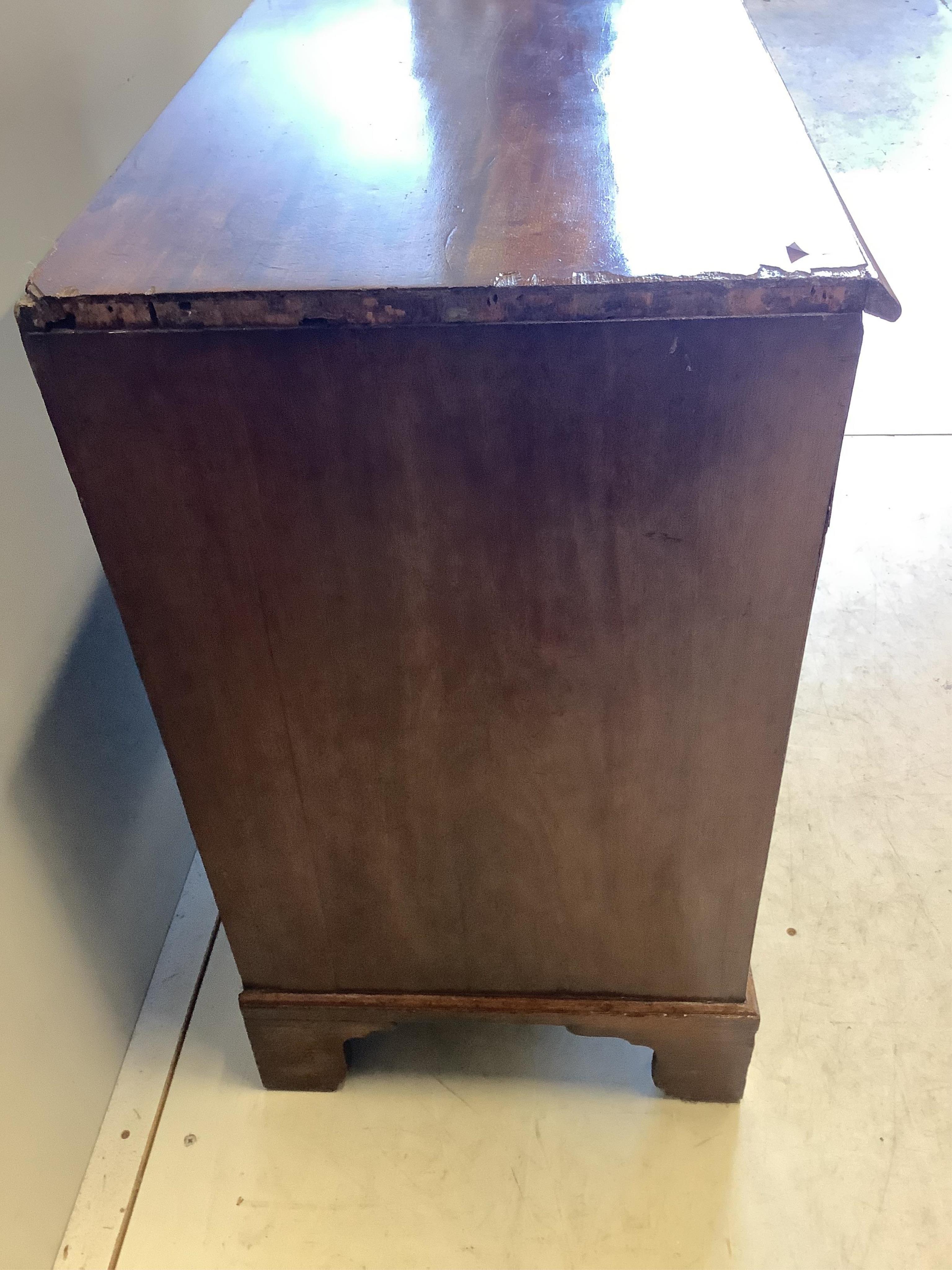 A George III mahogany kneehole desk, width 78cm, depth 43cm, height 78cm. Condition - poor